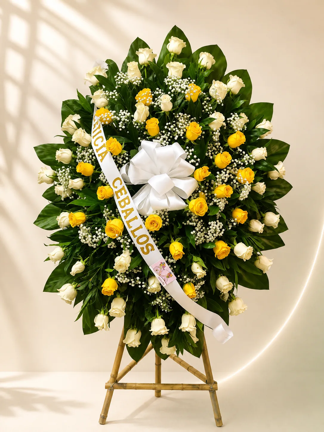 Corona fúnebre en trípode rosas y girasoles a domicilio Cali